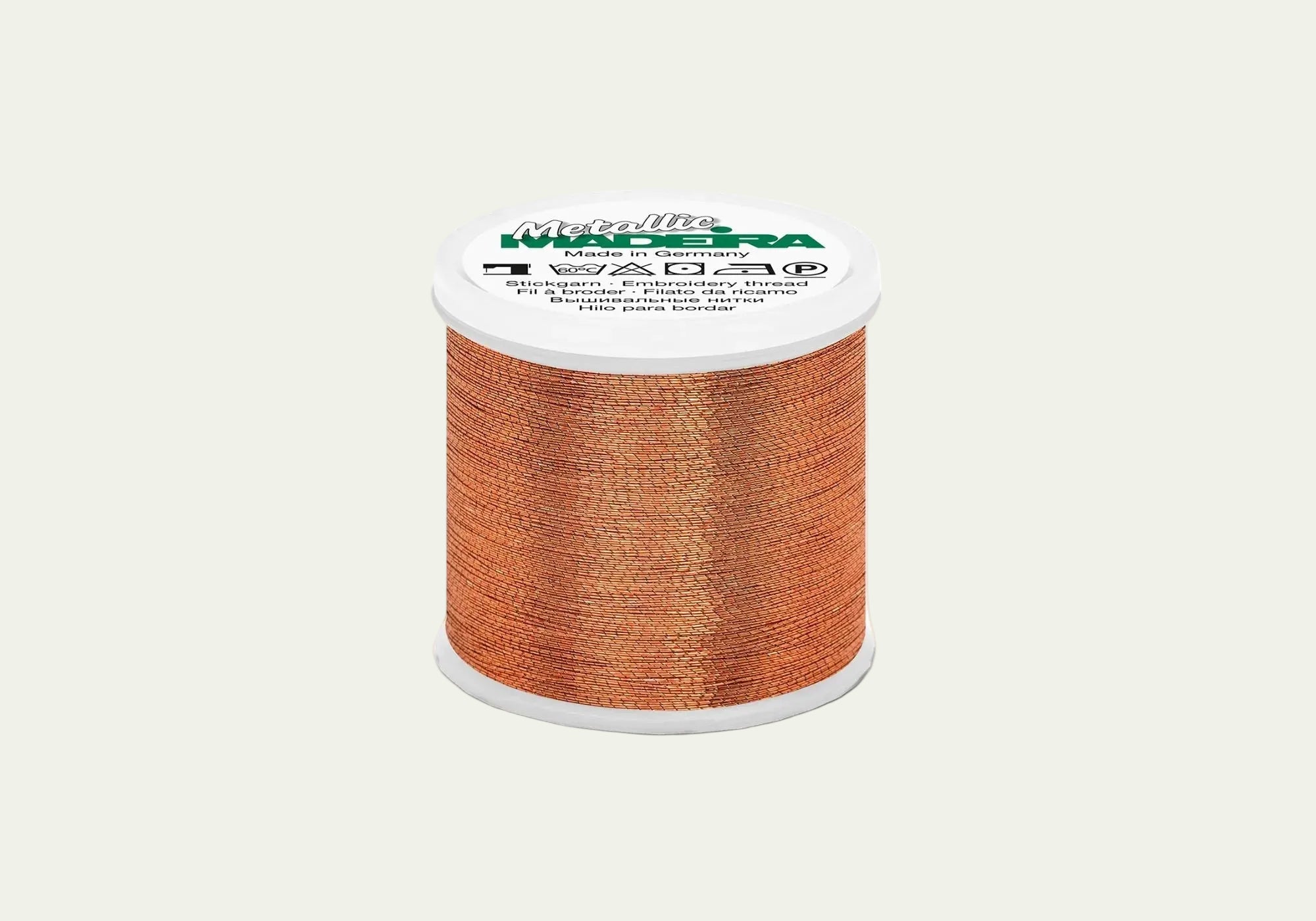 Madeira Metallic bronze embroidery thread cone with high-shine metallic finish for machine embroidery, decorative stitching, monograms, and specialty embroidery designs.