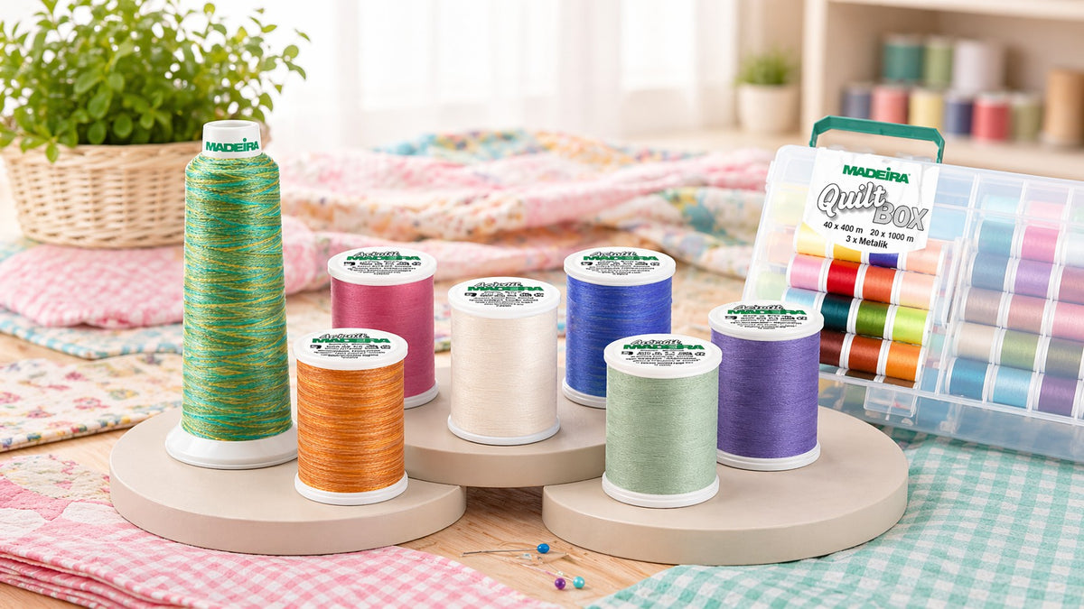 High quality quilting thread spools in multiple colors showing smooth finish and consistent winding for better stitch performance